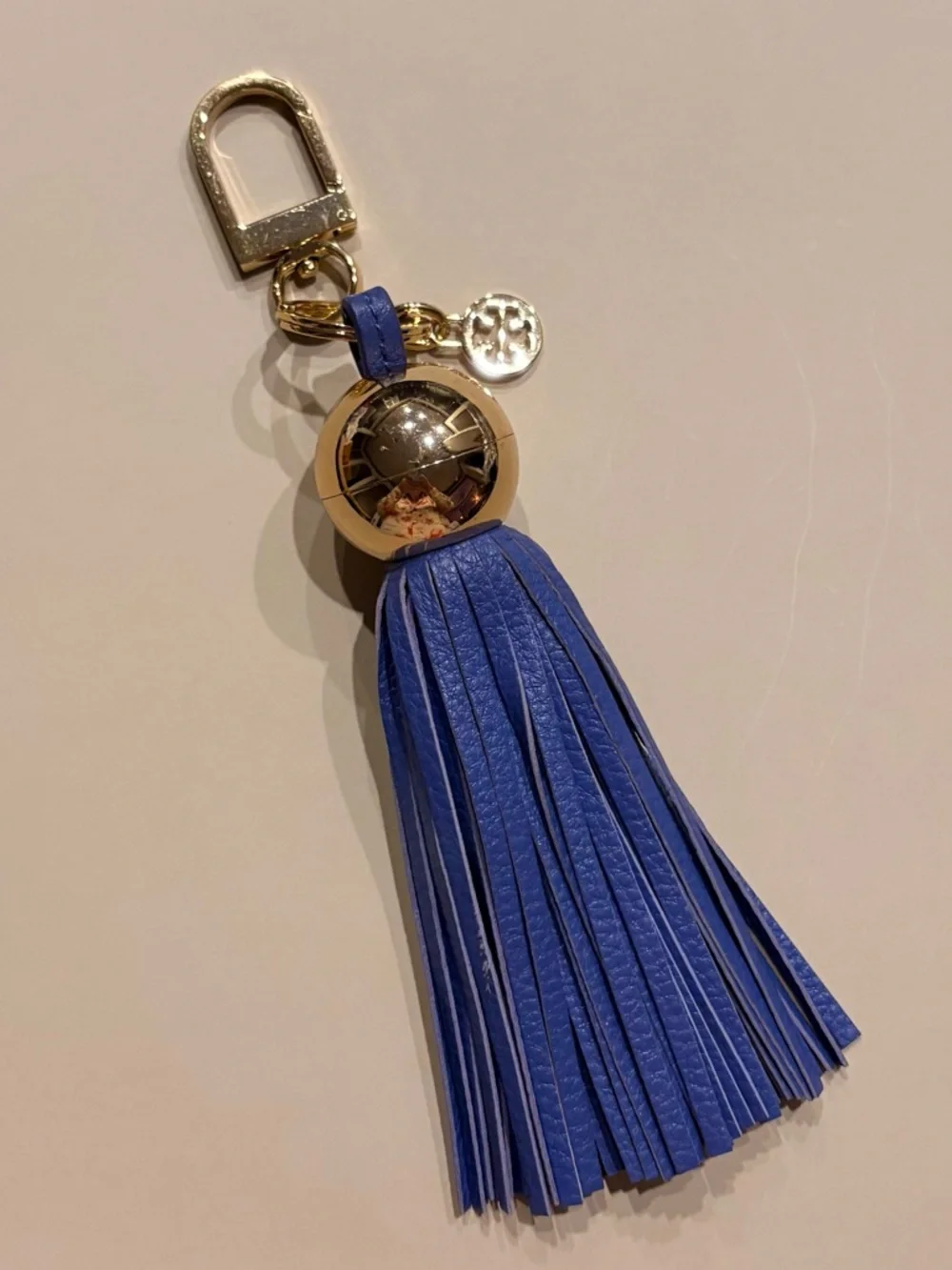 Tory Burch Tassel Key Fob in Gold and Blue Pebbled Leather. NWOT.